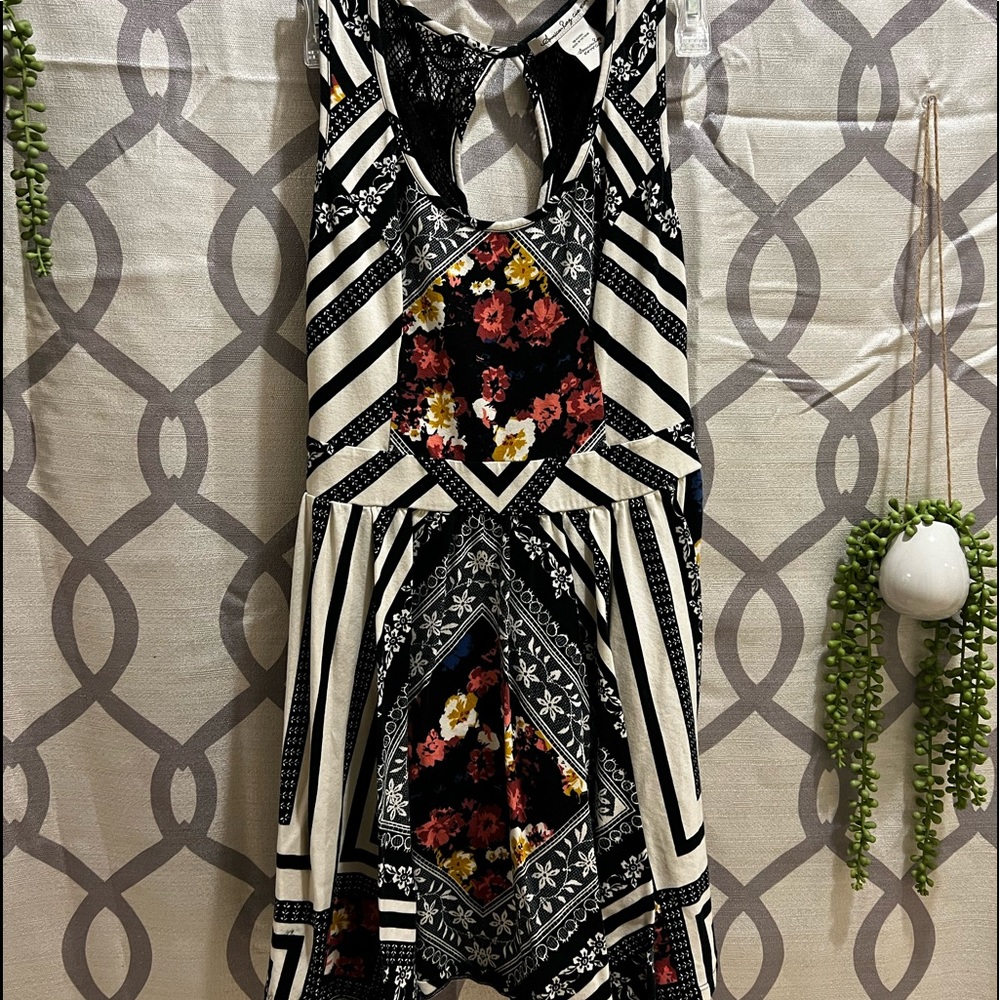American rag midi dress with mesh back and asymmetrical designs with bold floral